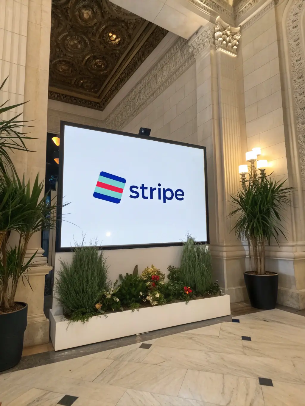A professional, well-lit studio shot of the Stripe logo on a clean, white background, emphasizing its modern design and brand identity.